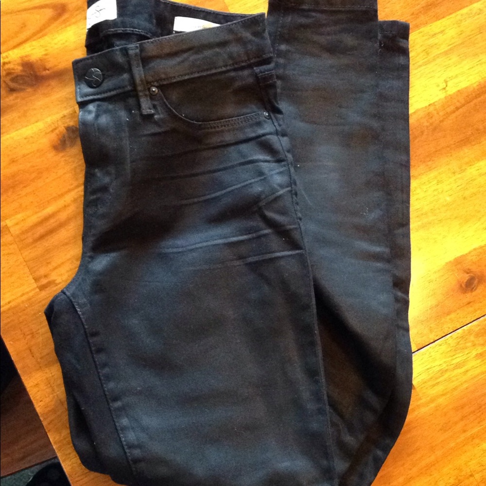 Black coated skinny jeans